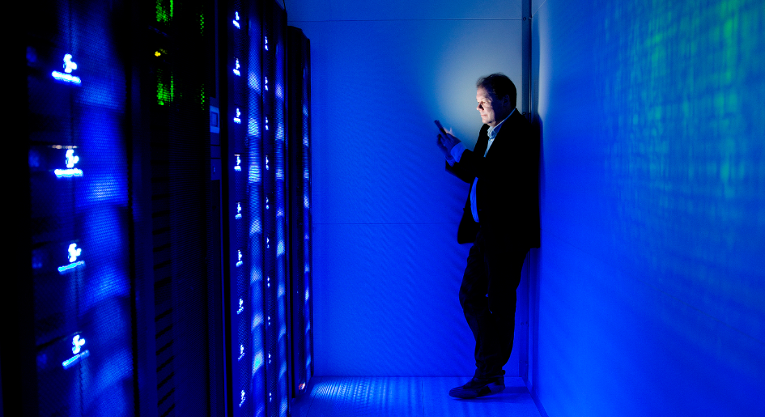 Søren Brunak in a dark server room